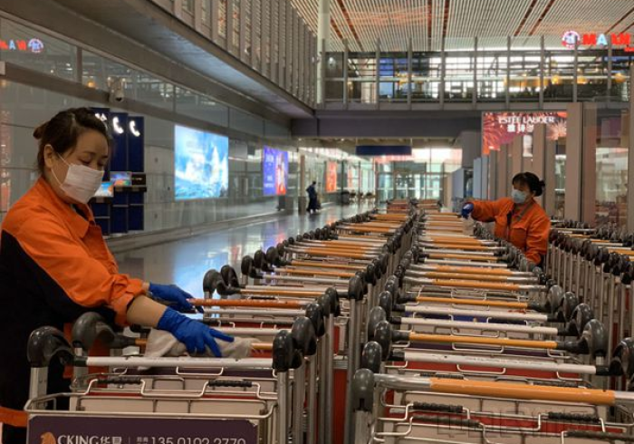 北京机场的钢铁防线与重庆的精准棋局,中国抗疫的双城记 北京机场的钢铁防线与重庆的精准棋局,中国抗疫的双城记